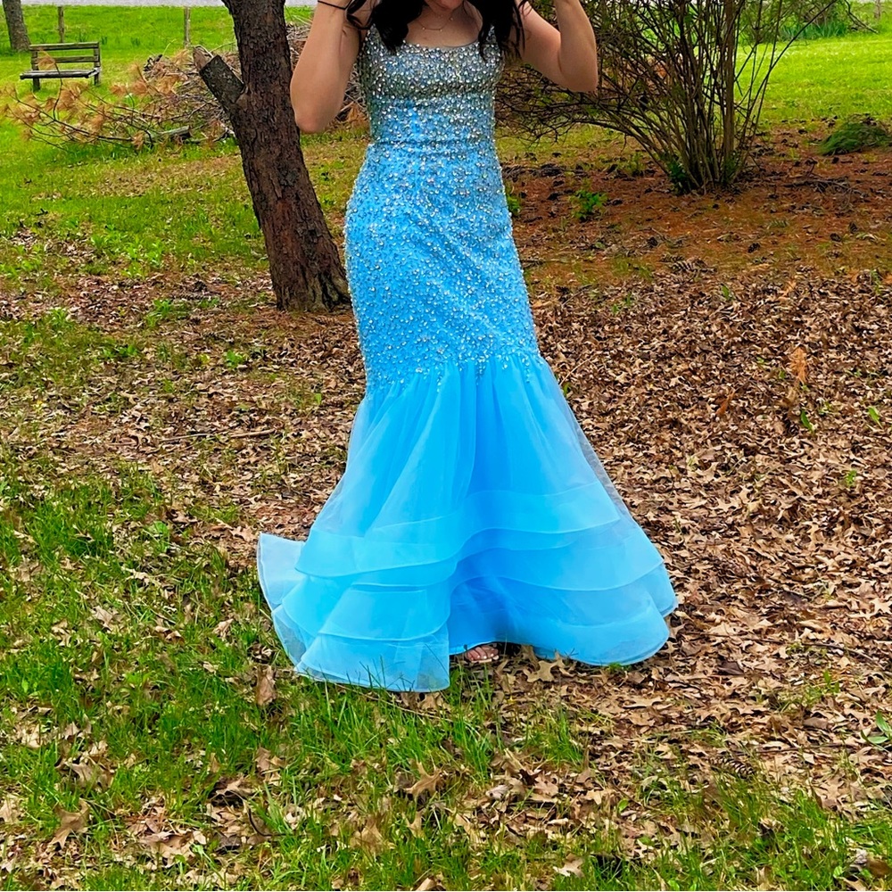 Mermaid style sequin prom dress with train